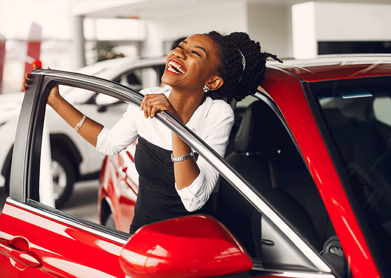 Photo of woman buying a car